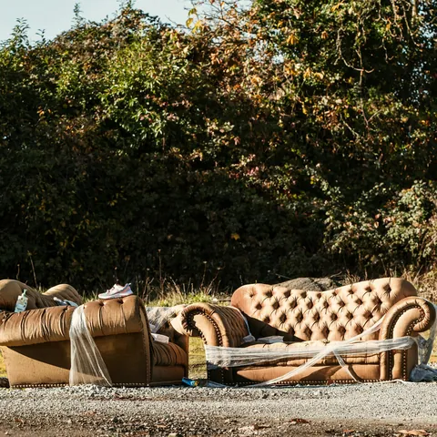 An old sofa left at the roadside