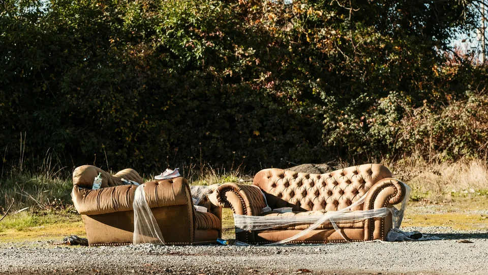 An old sofa left at the roadside